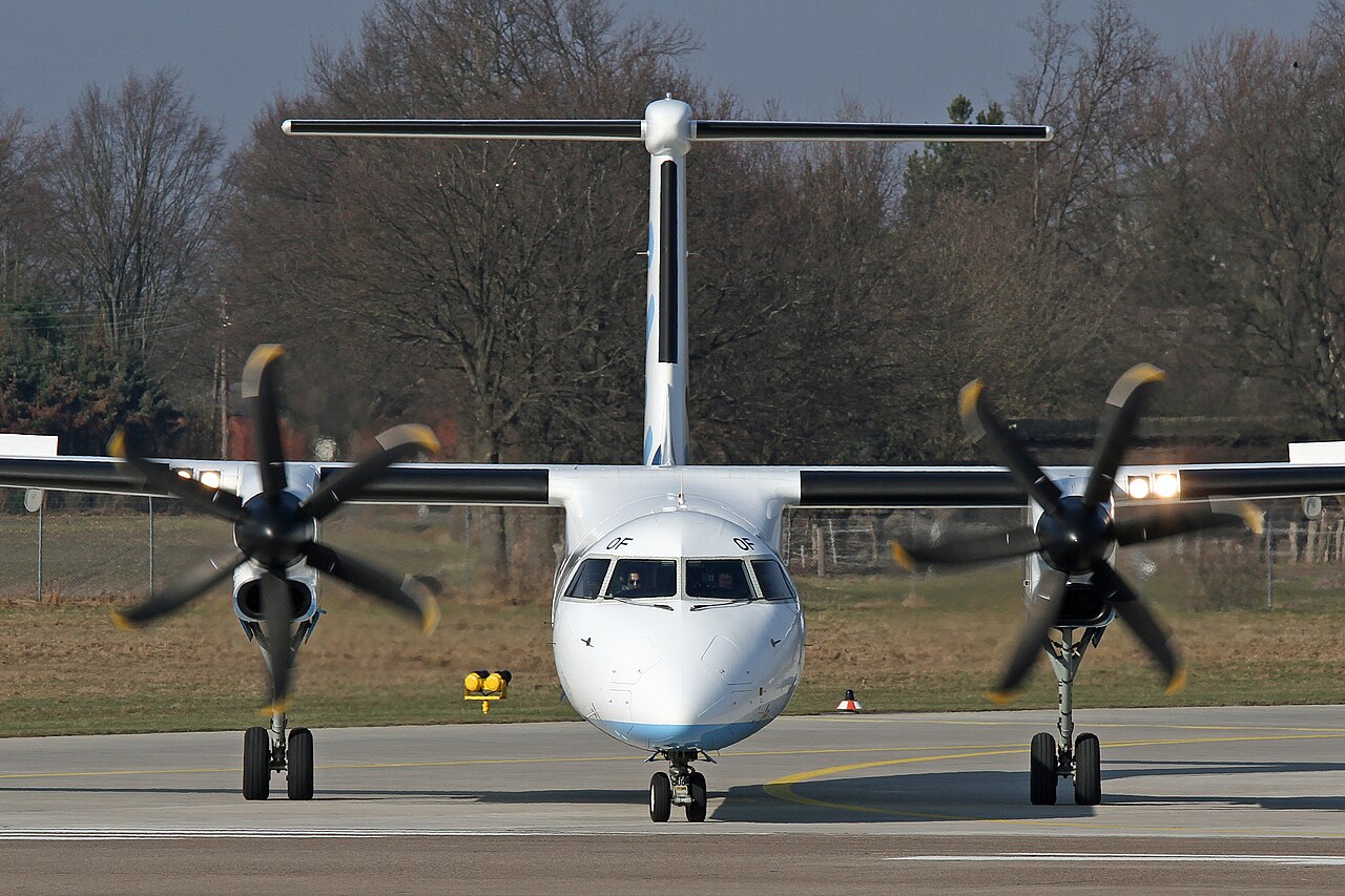 Dash 8 front view on the ramp